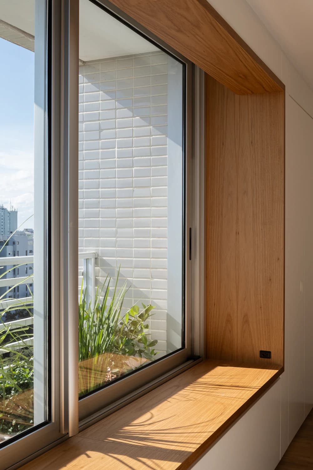 A newly installed window set into a finished wall